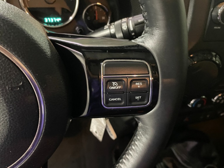 Used-2015-Jeep-Wrangler-Unlimited-Altitude-4x4-Manual